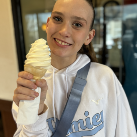 Teen girl eating a free birthday ice cream from Chick-fil-A